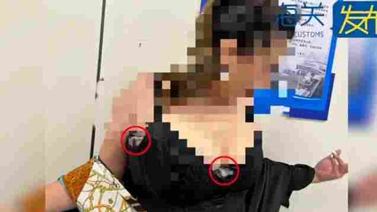 Woman Conceals 350 Switch Games in Bra